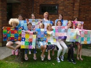YQs make quilts for charity!