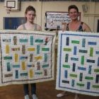 Rosie and mum Vicki with their finished quilts