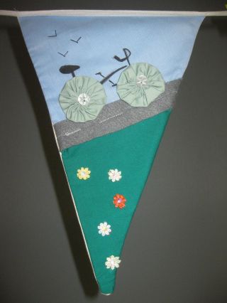 Quilts Inspired by Le Tour de France features YQ bunting