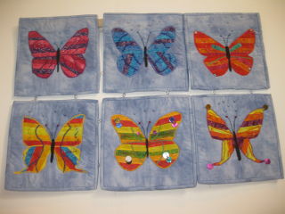 Group YQ quilts at the Festival of Quilts