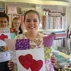 Mathilda with her heart cushion 